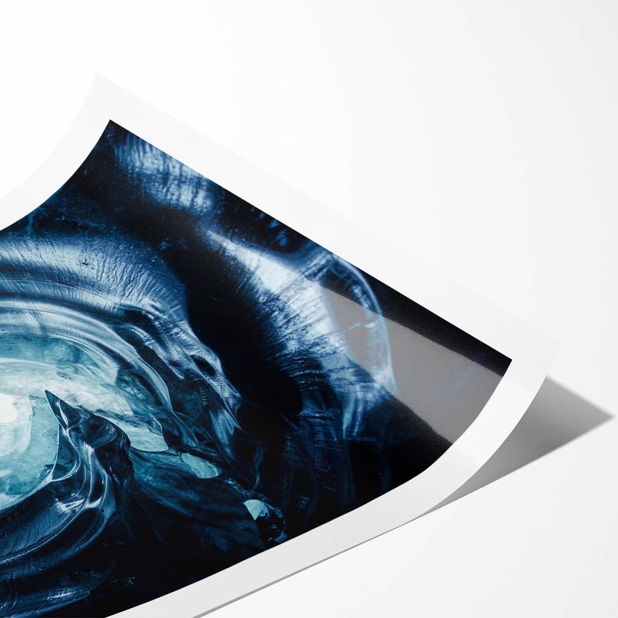 Vibrant rolled print of a glacier landscape design showcasing icy blues and whites, ideal for modern home decor, elegantly packaged in a protective cardboard tube.