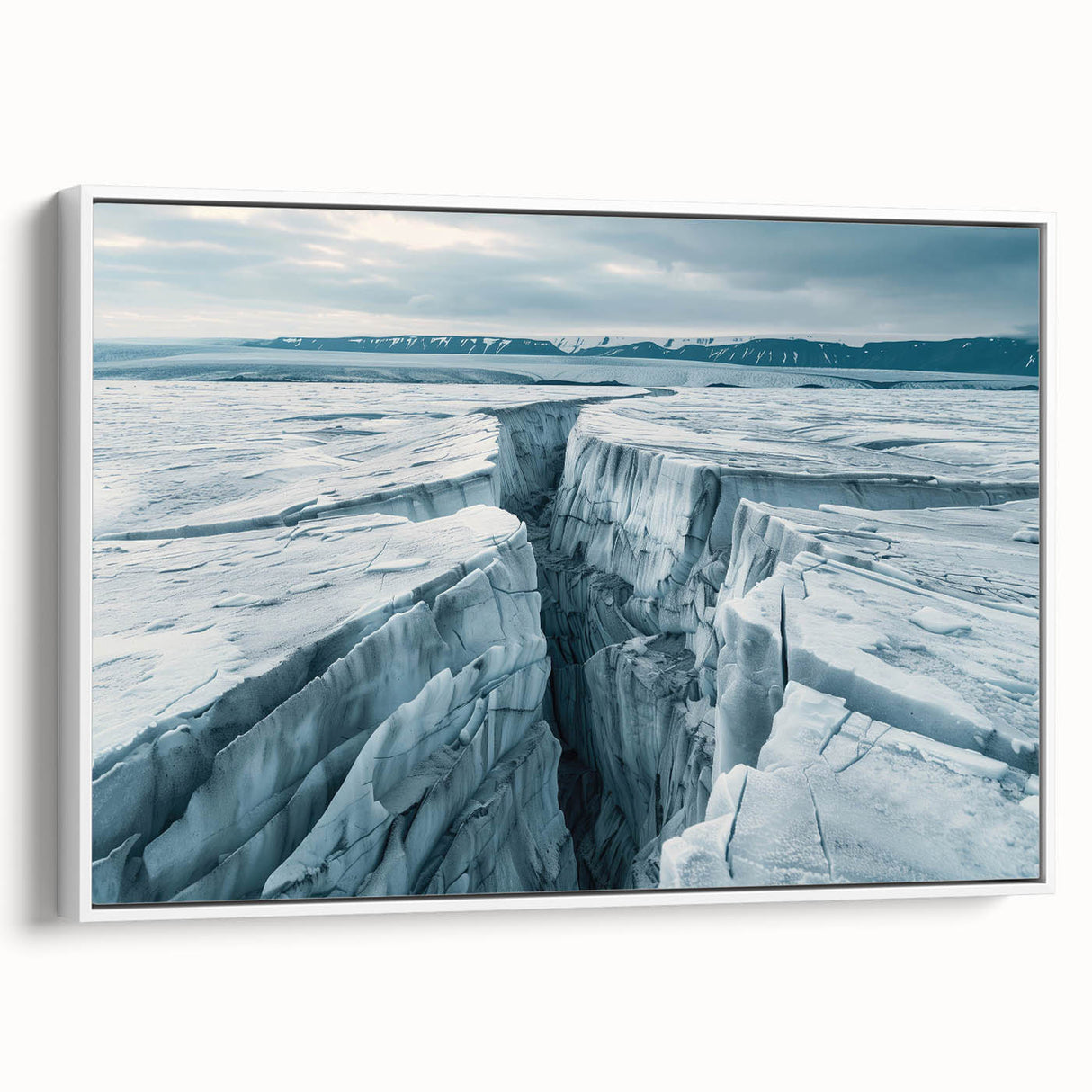 Framed canvas wall art featuring a stunning glacier landscape design with vibrant blues and whites, displayed from a side view on a modern white wall.