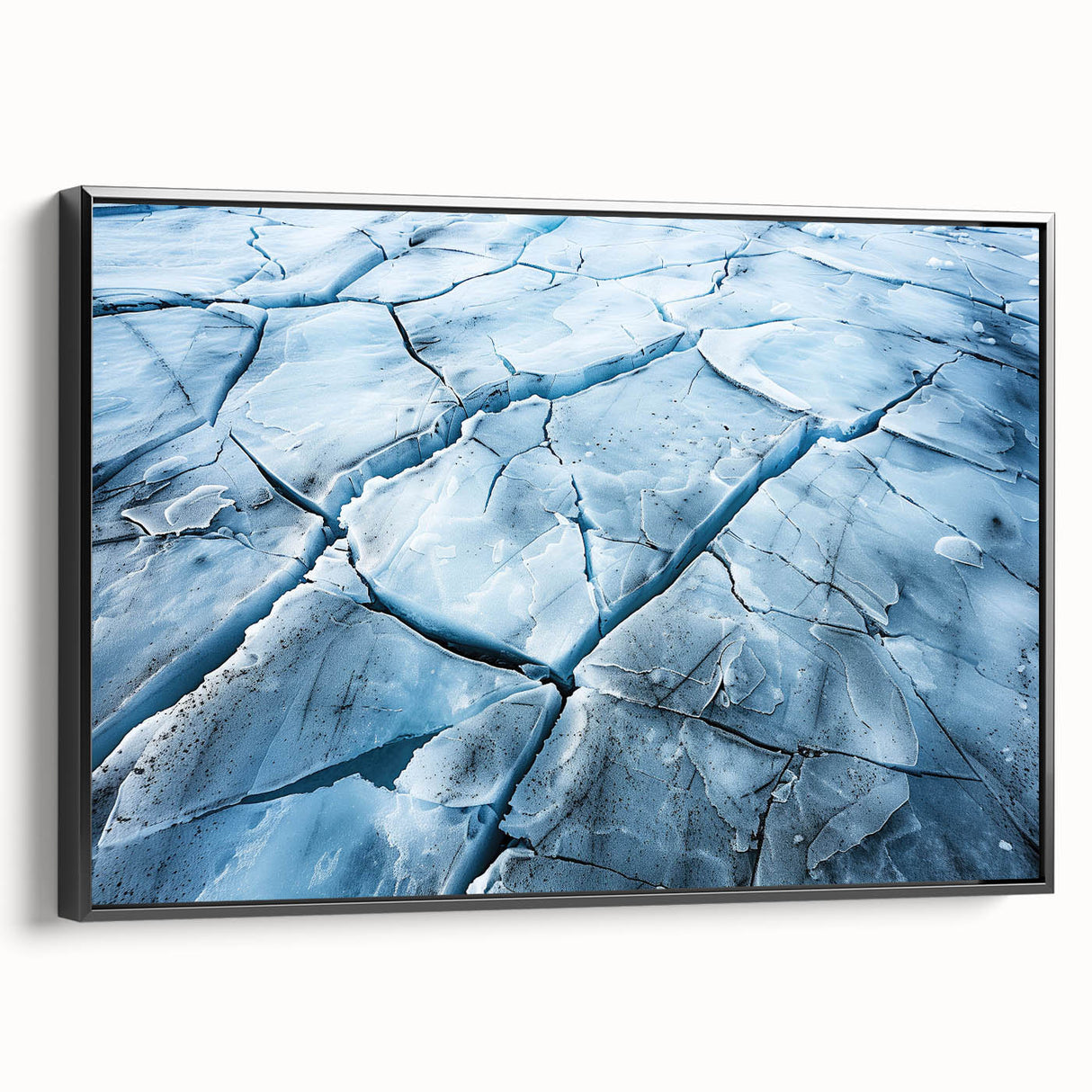 Framed canvas wall art featuring a stunning glacier landscape design, showcasing vibrant blue and white hues, with a sleek black frame for an elegant side view presentation. Perfect for enhancing modern home decor and bringing a touch of nature indoors.