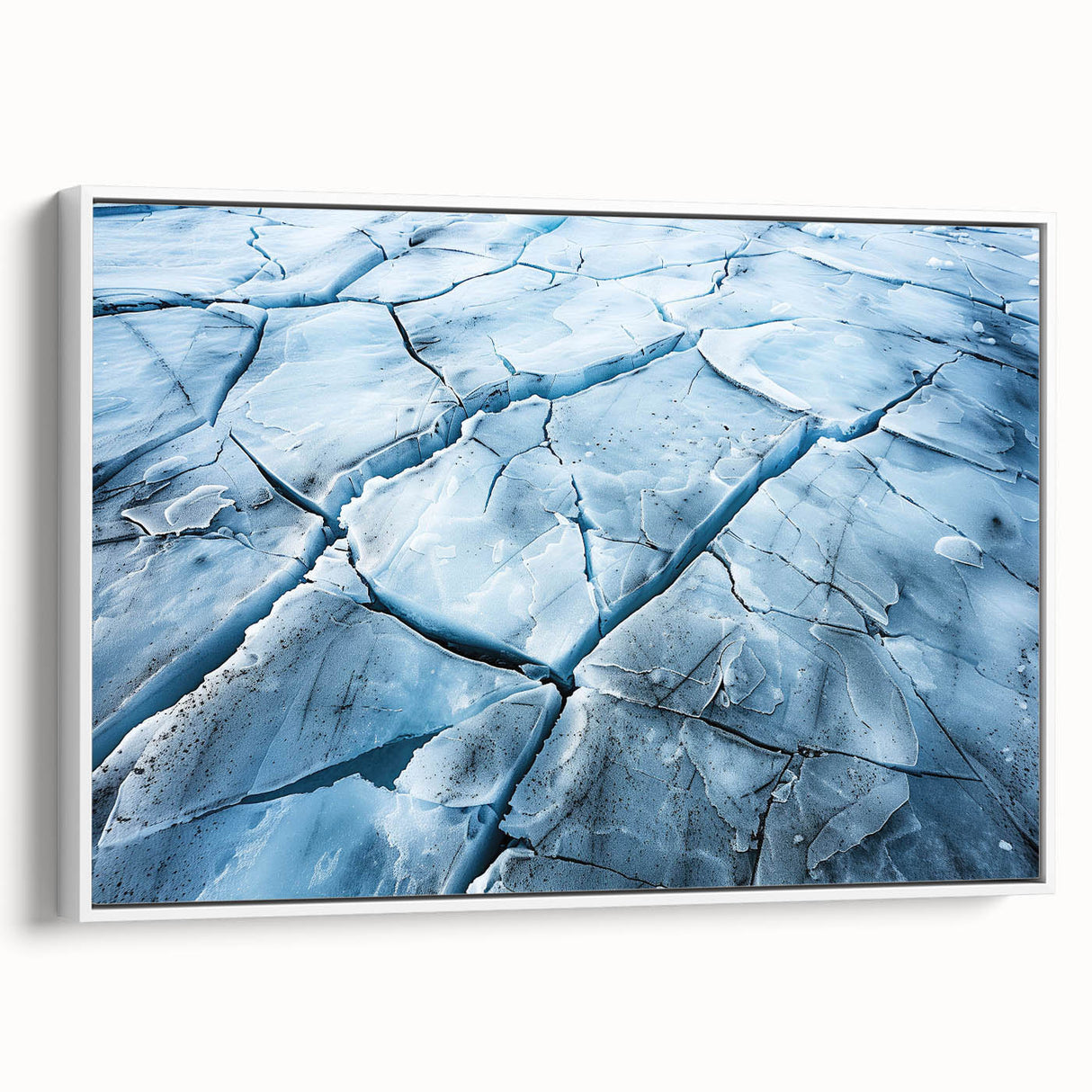 Framed canvas wall art showcasing a stunning glacier landscape design, featuring vibrant blues and whites, displayed from a side view against a white backdrop. Perfect for enhancing modern home decor.