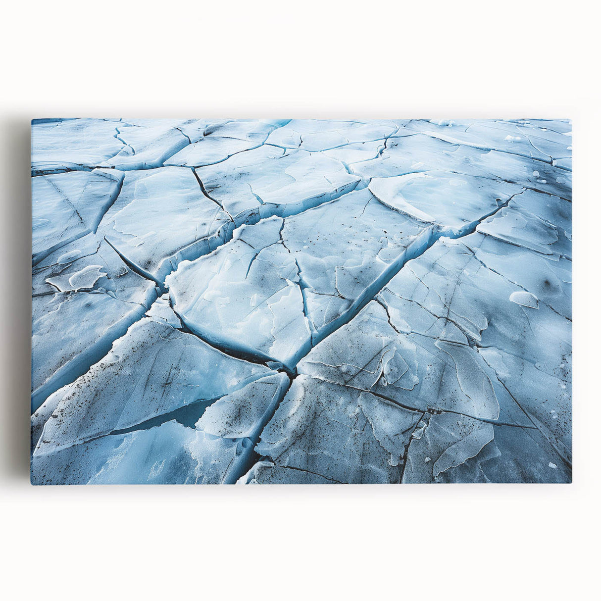 Stretched canvas artwork showcasing a stunning glacier landscape with vibrant blues and whites, perfect for home decor, enhancing any modern or rustic interior.