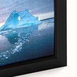 Close-up of a framed canvas wall art piece showcasing a stunning glacier landscape design, featuring icy blues and whites, perfect for modern home decor.