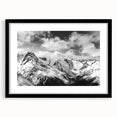 Framed wall art featuring a stunning glacier landscape design, displayed in a sleek black frame with a white mat, perfect for home decor.