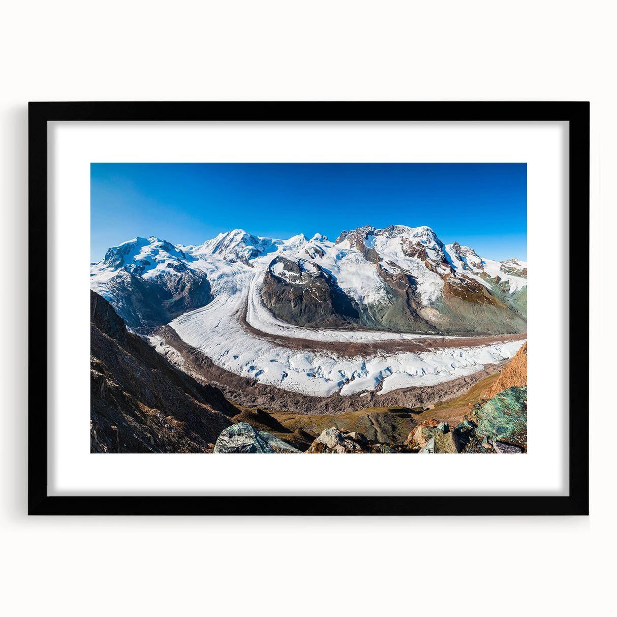 Framed wall art featuring a stunning glacier landscape design, showcased in a sleek black frame with a white mat, perfect for modern home decor. Ideal for nature lovers and interior design enthusiasts looking to enhance their living space with serene and captivating imagery.
