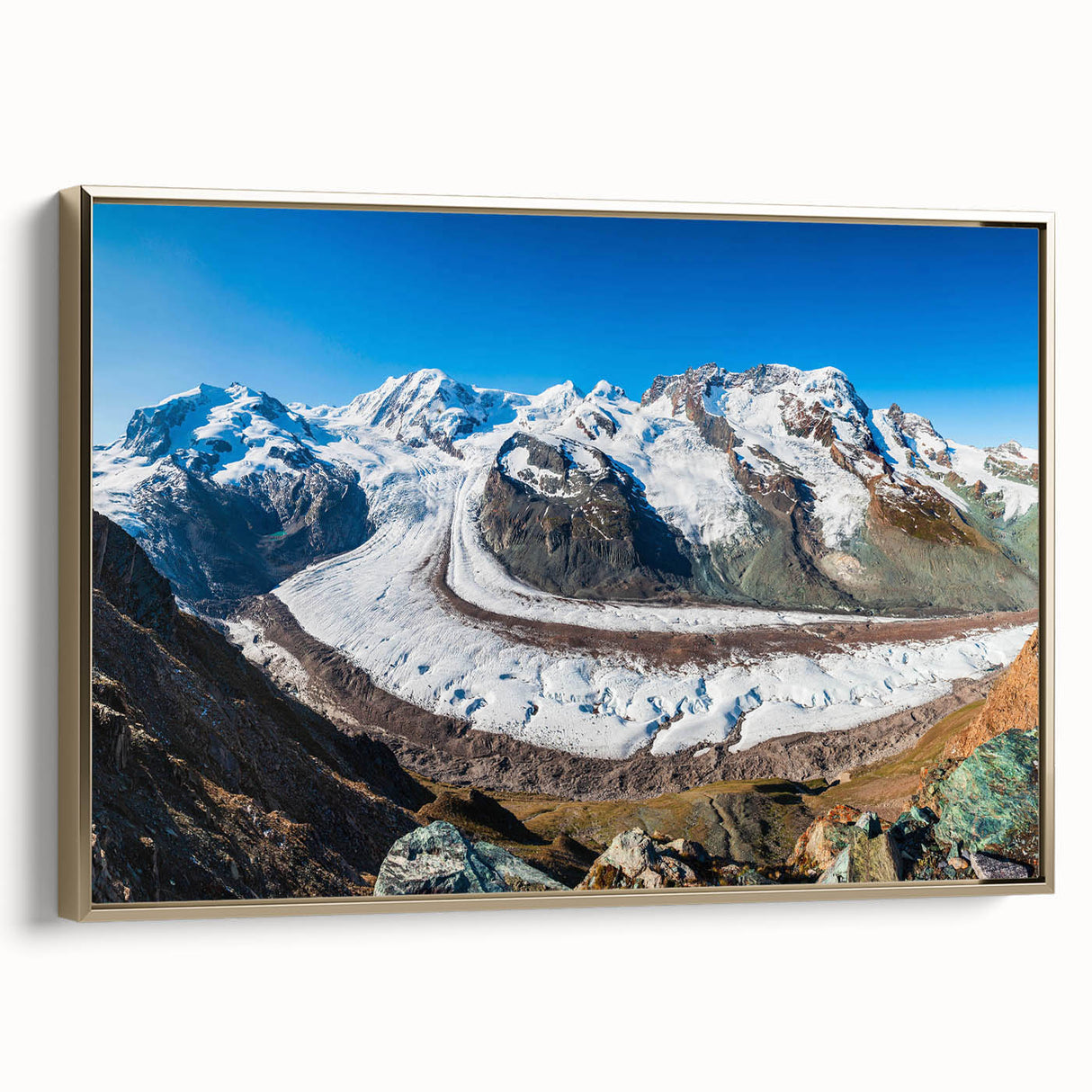 Framed canvas wall art showcasing a stunning glacier landscape design, featuring vibrant blues and whites, elegantly bordered in gold, perfect for modern home decor.