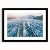 Framed wall art featuring a stunning glacier landscape design, with a sleek black frame and matting, perfect for adding a modern touch to any home decor.