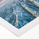 Stunning rolled canvas artwork showcasing a serene glacier landscape design, featuring vibrant blues and whites, perfect for home decor. Packaged securely for delivery.