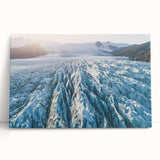 Stretched canvas artwork showcasing a serene glacier landscape with vibrant blue and white tones, perfect for enhancing modern home decor and creating a calming atmosphere.