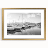 Elegant gold-framed wall art featuring a serene harbor landscape design, showcasing soft blues and greens, perfect for enhancing modern home decor aesthetics.