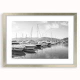 Framed silver wall art showcasing a tranquil harbor landscape, featuring soft blues and greens. Ideal for modern home decor, enhancing any living space with elegance.