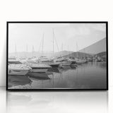 Framed acrylic wall art showcasing a serene harbor landscape design with a black frame, adding elegance to home decor. Ideal for nautical-themed interiors.