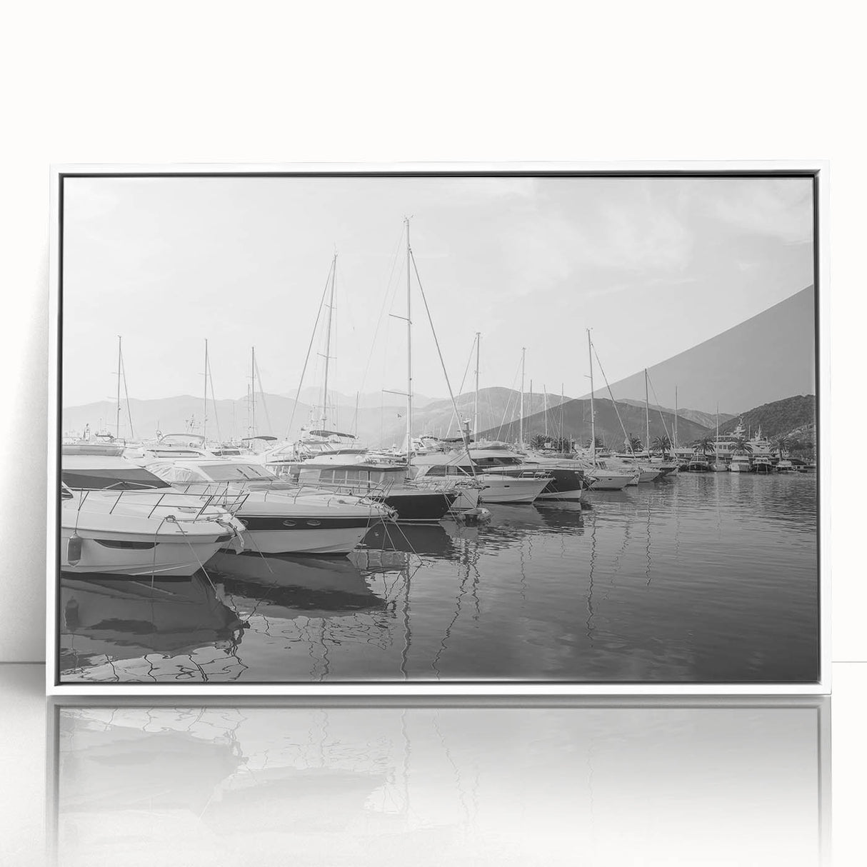 Framed acrylic wall art featuring a serene harbor landscape design with vibrant colors and a sleek white frame, perfect for enhancing modern home decor.