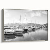 Framed canvas wall art featuring a serene harbor landscape with soft silver frame, perfect for enhancing home decor and creating a calming atmosphere.