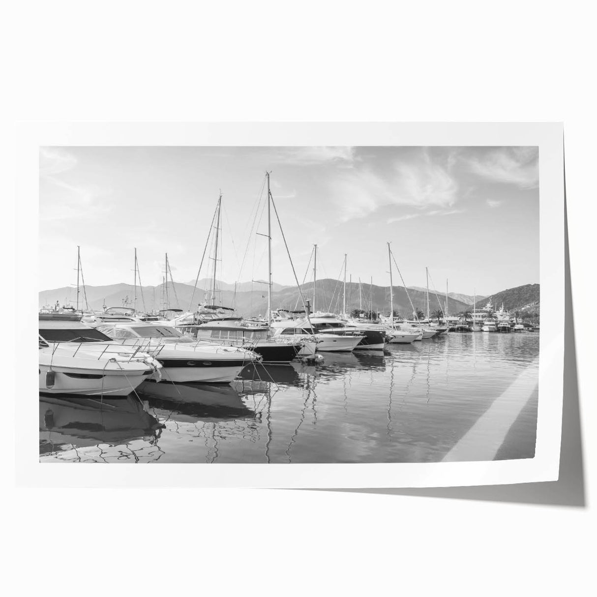 Rolled print of a serene harbor landscape, showcasing vibrant blues and greens with a tranquil atmosphere, ideal for home decor. Perfect for coastal-themed interiors.