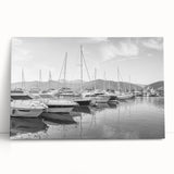 Stretched canvas artwork showcasing a serene harbor landscape in soft blues and greens, perfect for adding a tranquil touch to home decor.