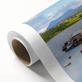 Rolled canvas artwork showcasing a vibrant harbor landscape with rich blues and greens, designed for wall display, highlighting serene water reflections and artistic details.