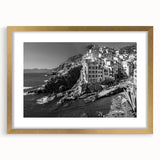 Golden-framed wall art featuring a serene harbor landscape design, beautifully matted for enhanced presentation, ideal for home decor enthusiasts.