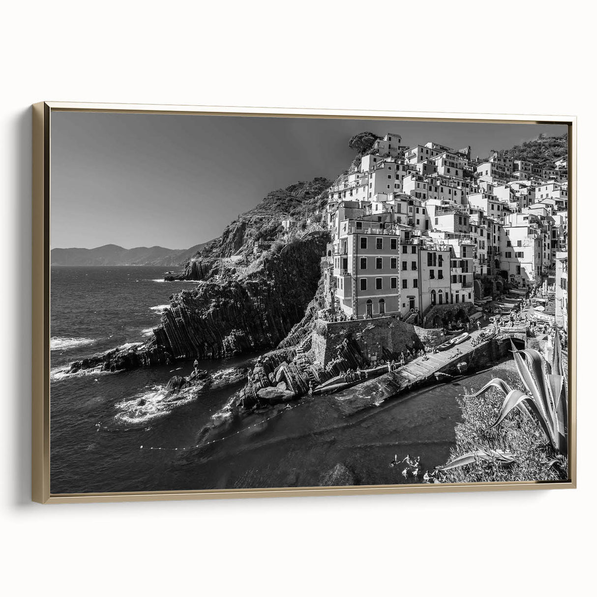 Framed canvas wall art showcasing a serene harbor landscape design with golden accents, elegantly displayed from a side view, ideal for modern home decor.