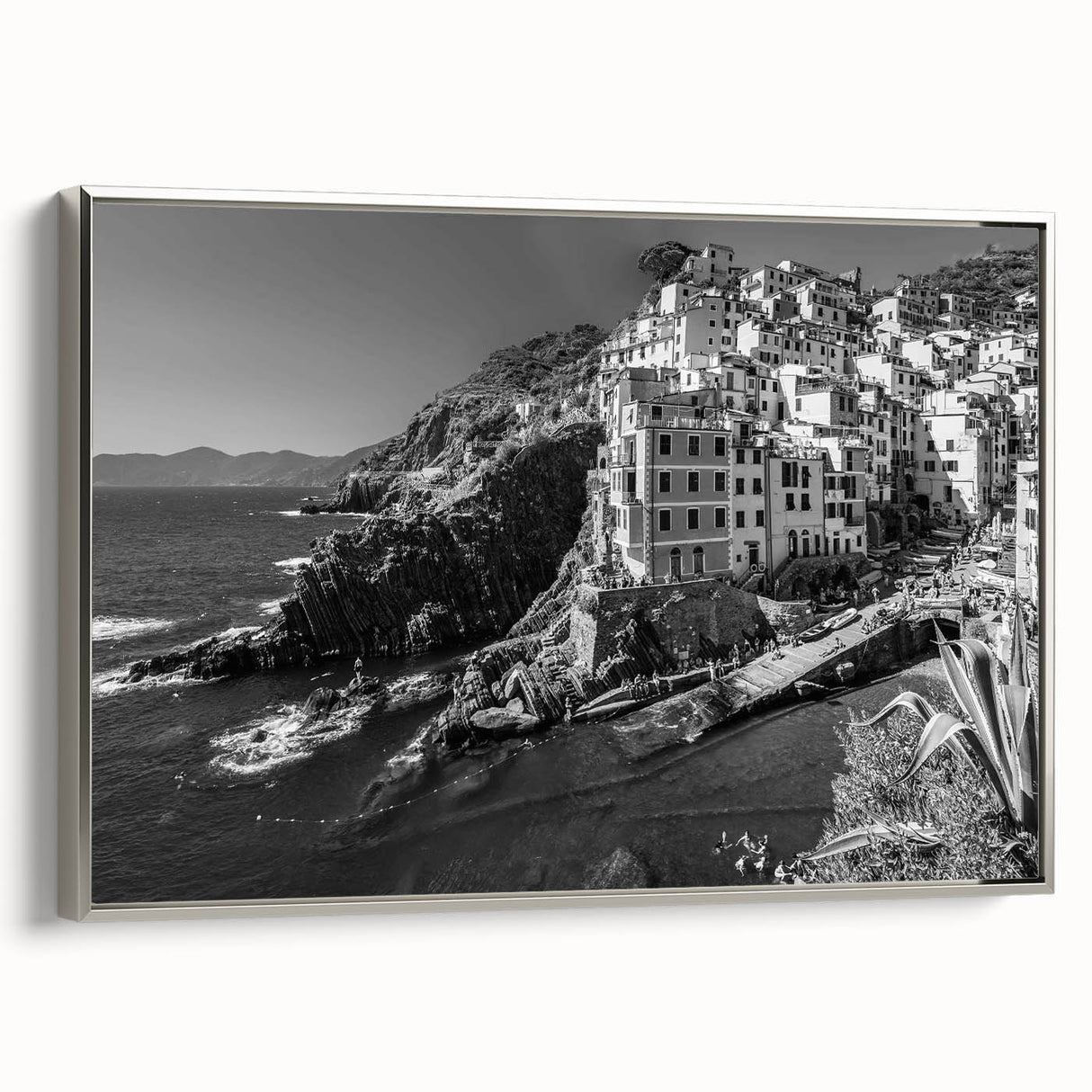 Framed canvas wall art showcasing a serene harbor landscape with soft colors, silver frame accents, perfect for enhancing modern home decor.