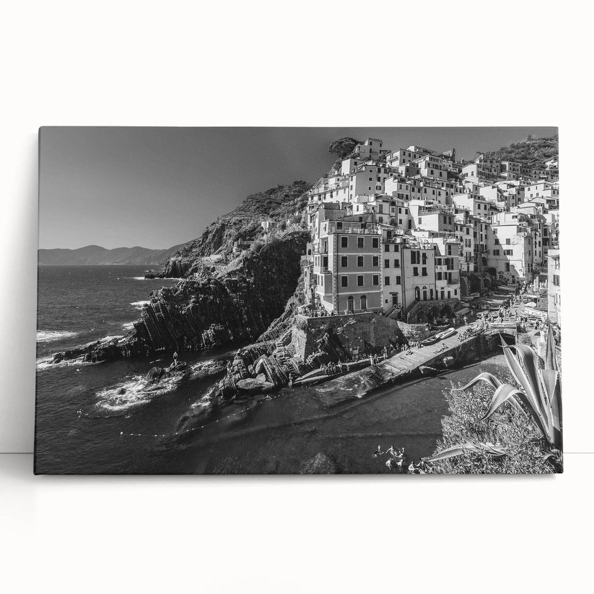Stretched canvas wall art showcasing a serene harbor landscape design, featuring soft blue waters and vibrant sunset colors, perfect for home decor.