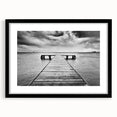 Framed wall art featuring a serene harbor landscape design with a black matte frame, perfect for enhancing home decor and creating a tranquil atmosphere.