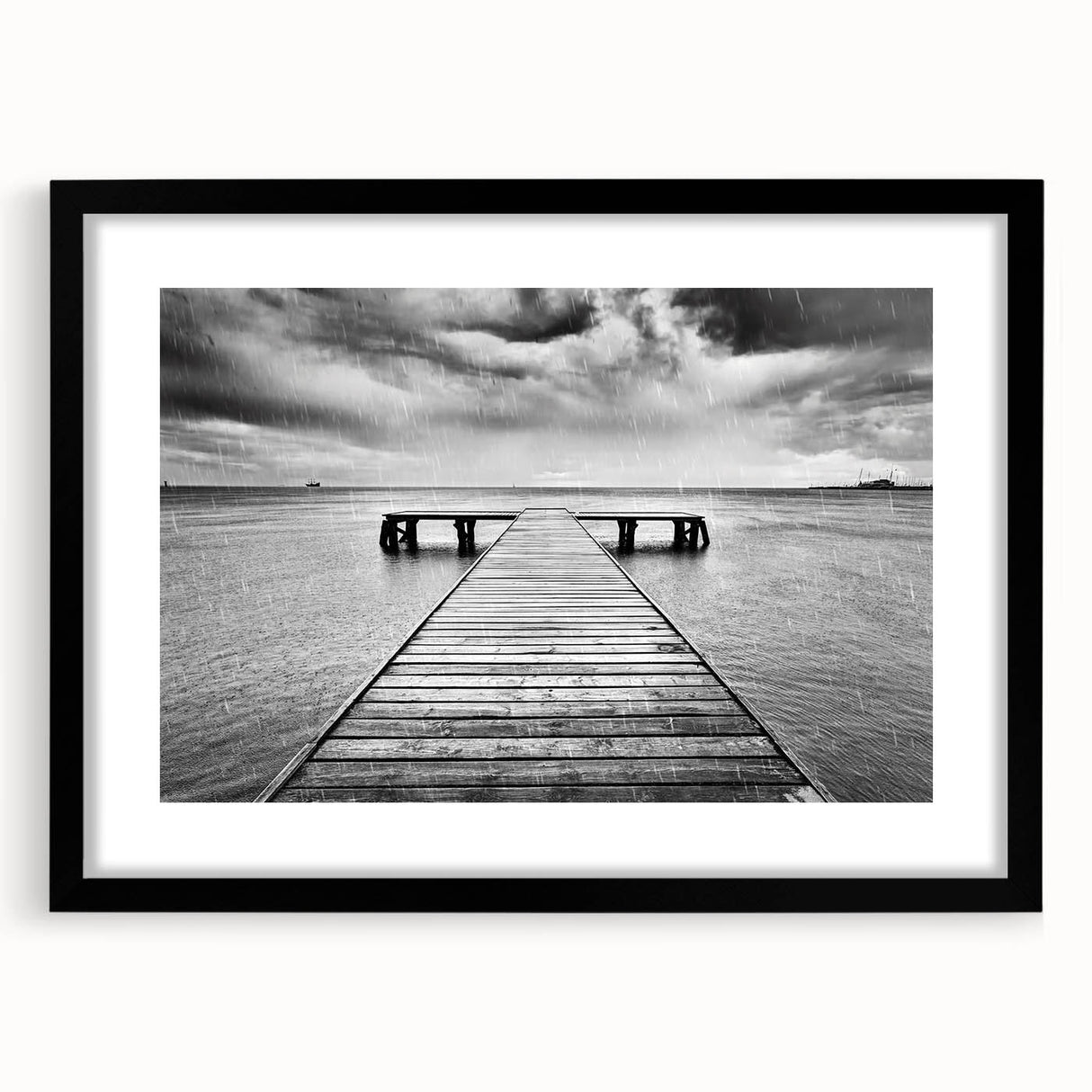 Framed wall art featuring a serene harbor landscape design with a black matte frame, perfect for enhancing home decor and creating a tranquil atmosphere.