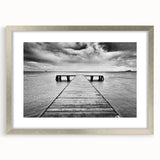 Framed silver mat wall art showcasing a serene harbor landscape design, ideal for enhancing home decor with coastal elegance and tranquility.