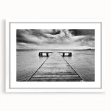 Elegant white-framed wall art showcasing a serene harbor landscape design, featuring soft blues and greens, perfect for enhancing home decor aesthetics.