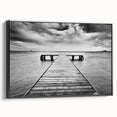 Framed canvas wall art showcasing a serene harbor landscape design, featuring vibrant colors and detailed textures, presented from a side view with a sleek black frame.