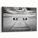 Framed canvas wall art showcasing a serene harbor landscape design, featuring vibrant colors and detailed textures, presented from a side view with a sleek black frame.