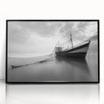 Framed acrylic wall art showcasing a serene harbor landscape design, featuring calming blues and greens in a sleek black frame, ideal for modern home decor.