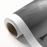 Rolled canvas showcasing a serene harbor landscape design in vibrant colors, ideal for home decor, featuring gentle waves and a clear blue sky, packaged securely for safe delivery.