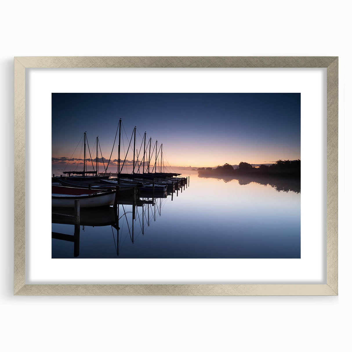 Framed landscape wall art collection showcasing a serene harbor scene, featuring a silver frame and matting, ideal for modern home decor.
