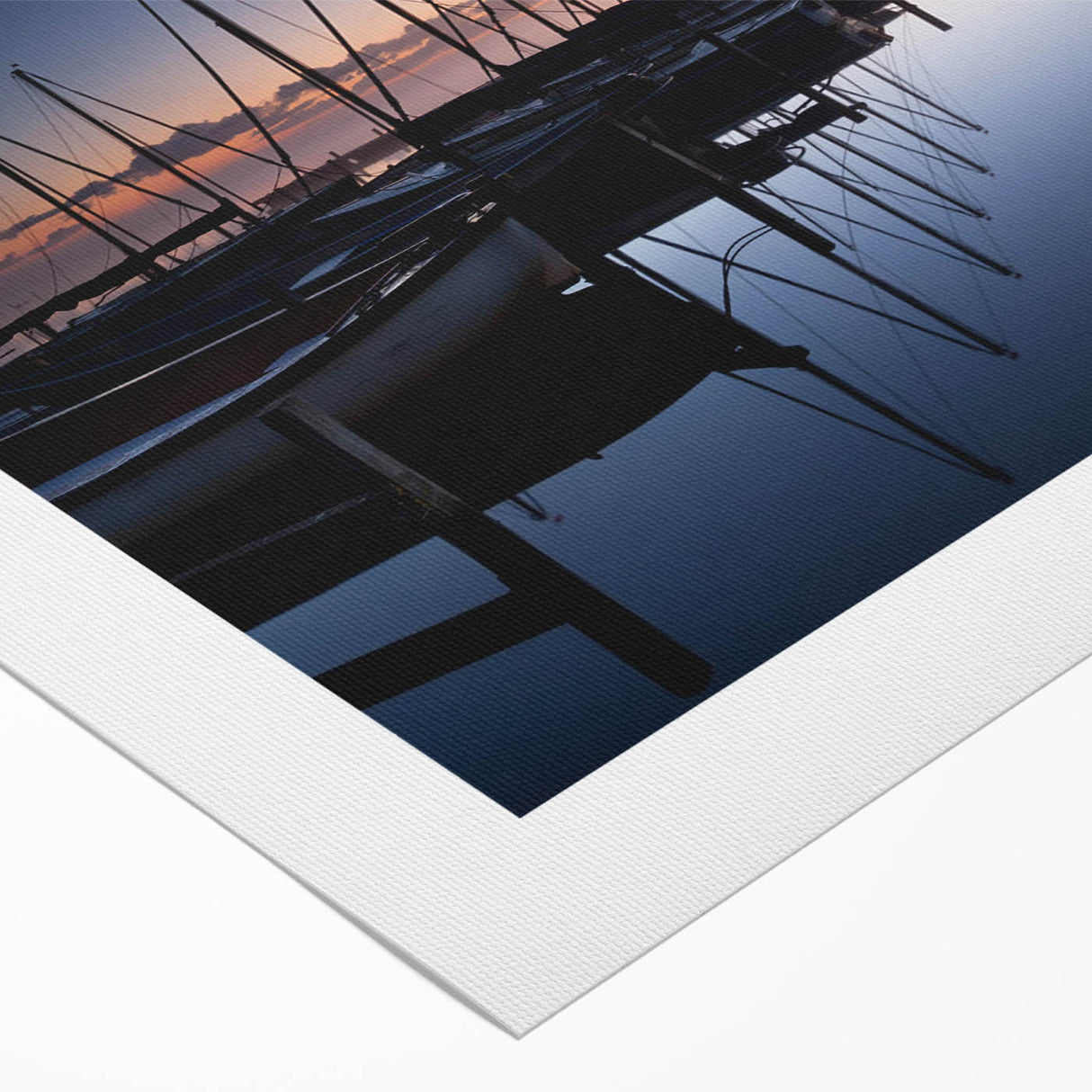 Rolled canvas artwork showcasing a serene harbor landscape with soft blues and greens, presented in a protective cardboard tube, ideal for home decor.