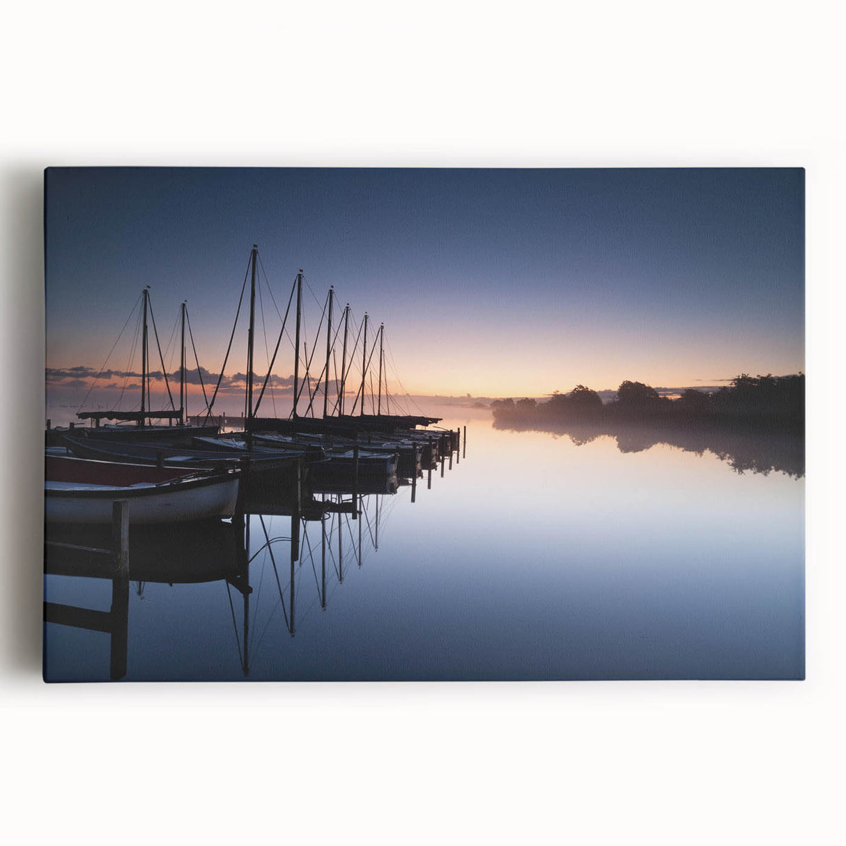 Stretched canvas wall art featuring a serene coastal harbor landscape, showcasing vibrant blues and greens, perfect for adding tranquility to any room decor.