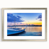 Framed silver wall art featuring a serene harbor landscape design, with a mat for added depth, perfect for enhancing modern home decor aesthetics.