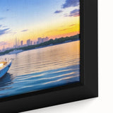 Close-up of a framed canvas wall art featuring a serene harbor landscape with vibrant colors, showcasing intricate details of the water and sky, perfect for home decor.