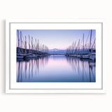 Framed landscape harbor wall art collection showcasing tranquil blue hues, white matting, and a modern aesthetic, perfect for enhancing home decor.
