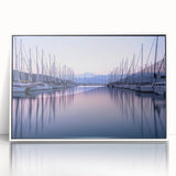 Framed acrylic wall art showcasing a serene harbor landscape design, featuring soft blue and white hues. Perfect for enhancing modern decor with a touch of tranquility.