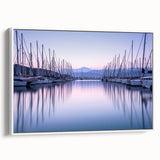 Framed canvas wall art collection showcasing a serene harbor landscape with soft blue and white hues, designed to enhance modern home decor.