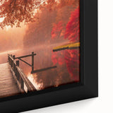 Framed canvas wall art showcasing a serene harbor landscape, featuring vibrant blues and greens, perfect for enhancing home decor with a coastal theme.