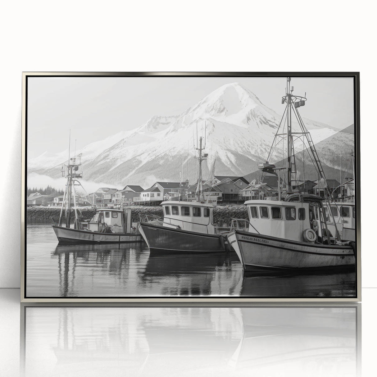 Framed acrylic wall art featuring a serene harbor landscape with tranquil blue waters and vibrant sunset hues, elegantly displayed with a sleek silver frame.