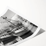 Rolled print showcasing a serene harbor landscape with vibrant colors and intricate details, ideal for home decor or office spaces, packaged securely in a sturdy tube.