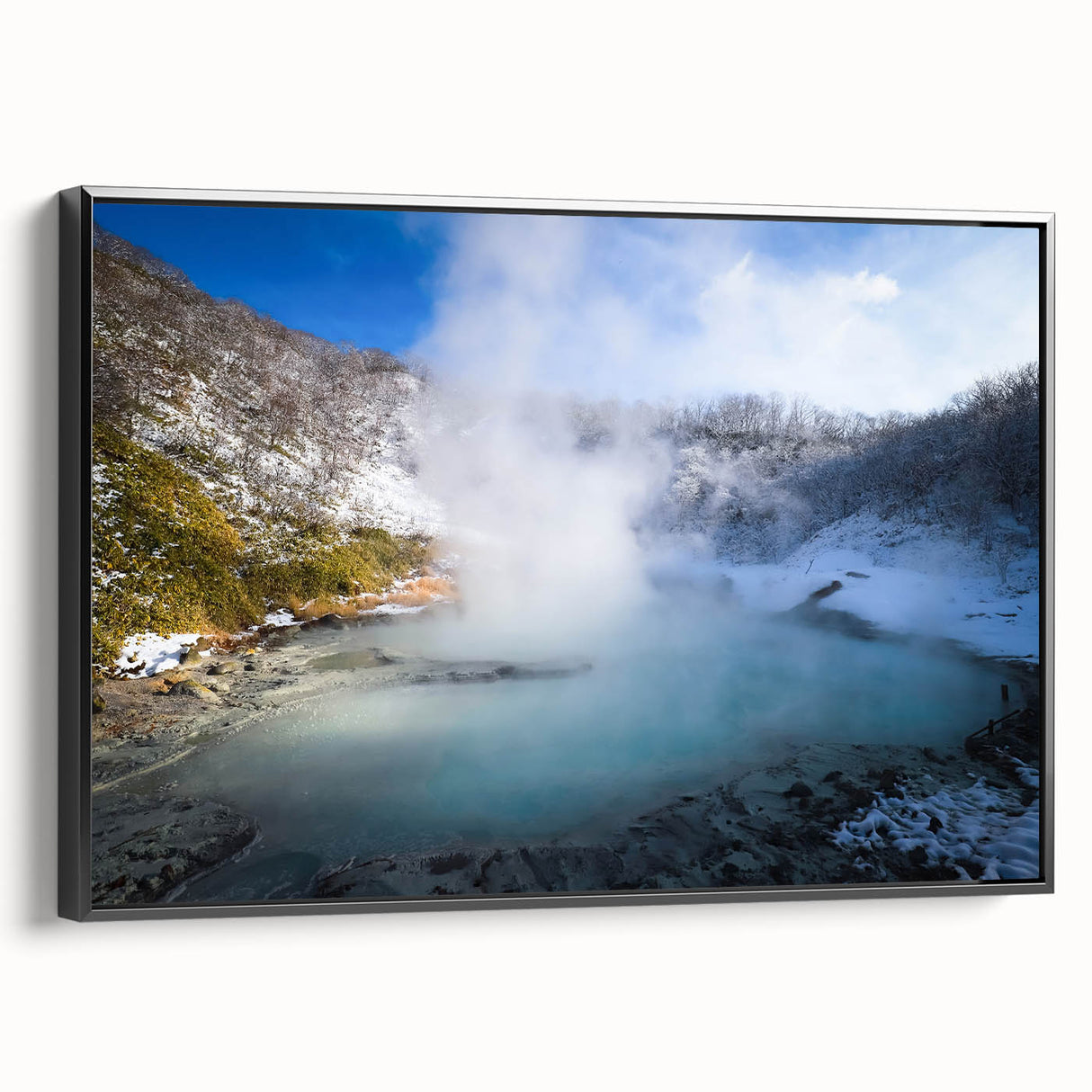 Framed canvas wall art depicting a serene hot spring landscape design in vibrant colors with a black frame, ideal for modern home decor accents.