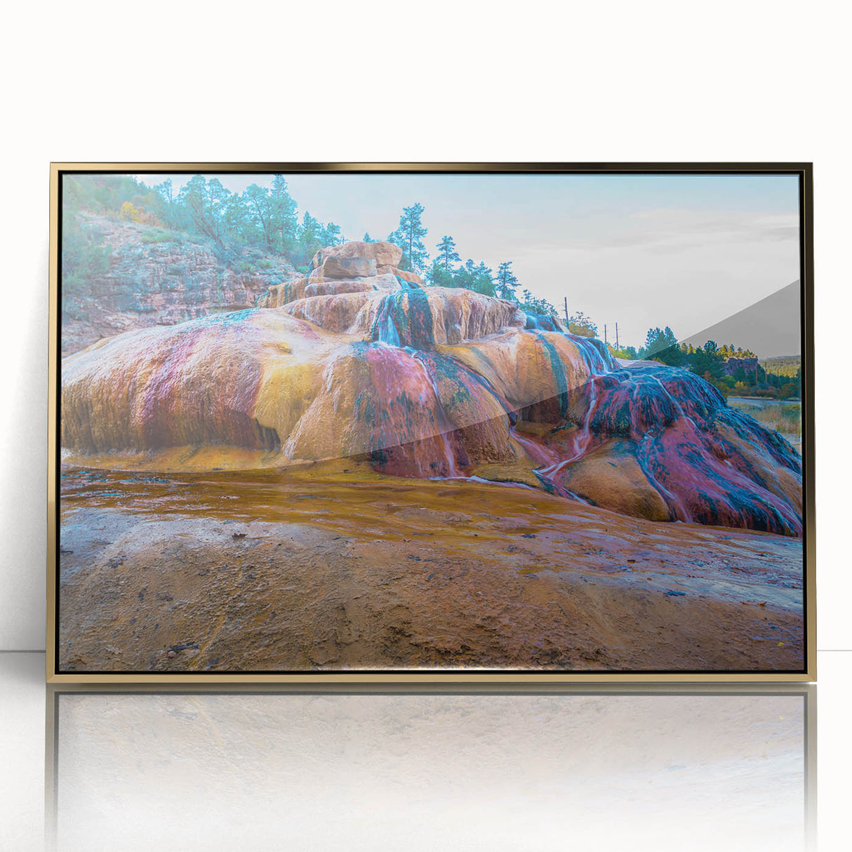 Framed wall art featuring a serene hot spring landscape, showcasing vibrant natural colors and a gold-accented frame, perfect for home decor.