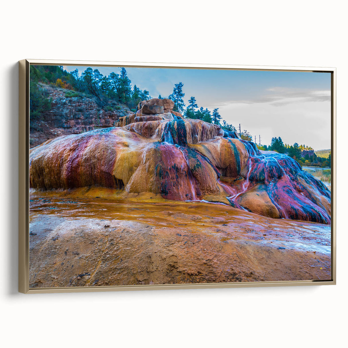Framed canvas wall art showcasing a serene hot spring landscape, featuring vibrant greens and calming blues, with a luxurious gold frame complementing the design.