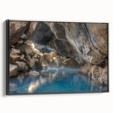 Framed canvas wall art showcasing a serene hot spring landscape design, featuring vibrant colors and intricate details, presented from a side view on a black frame.