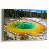 Framed canvas wall art showcasing a serene hot spring landscape design in soothing blue and green tones, featuring a sleek silver frame, perfect for home decor.