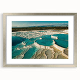 Framed wall art collection featuring a serene hot spring landscape design, set in a sleek silver frame with a mat, perfect for home decor enhancement.