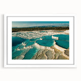 Framed wall art collection showcasing serene hot spring landscapes, featuring a white mat and elegant frame, perfect for home decor in a calming setting.